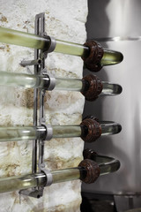 Fototapeta premium Old transparent glass pipeline system for wine