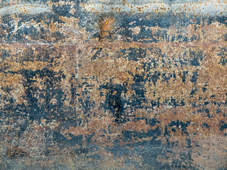 rusty boat hull with many rough edges