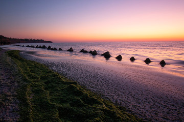 Seascape in violet before sunrise. Unreal colors without filters and processing. On the beach for fishing in Krapets. Northern Black Sea Coast, Bulgaria.