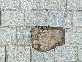stone floor with an exploded tile
