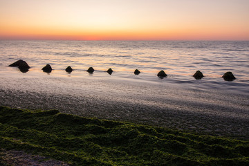 Fisherman's beach in Krapets in fantastic sunrise colors. Northern Black Sea Coast, Bulgaria.