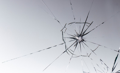 Cracked glass on a white background texture