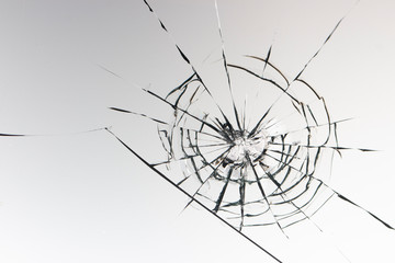 Cracked glass on a white background texture
