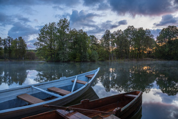 Obraz premium Landscape with two boat on foreground in early morning