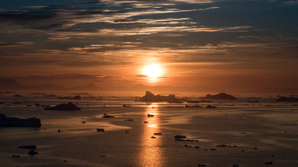 sunset in arctic ocean