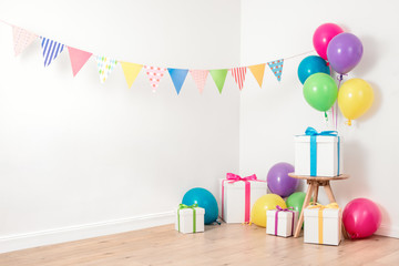 Colorful flag garland and balloons for party decoration