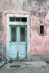 Fototapeta na wymiar blue door in old house