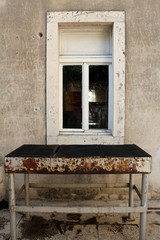Fototapeta na wymiar window in old house with grill