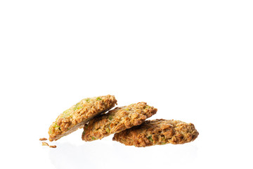 Homemade cookies on a white background. Pyramid of cookies. Cookies on top of each other.