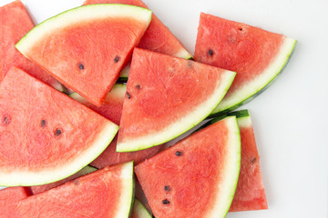 Close-up of fresh slices of red watermelon, top view, summer or food concept, flat lay