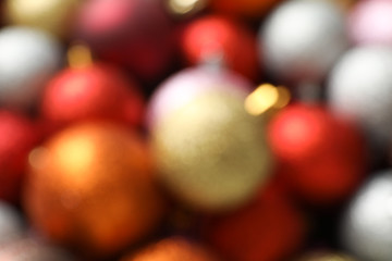 Blurred background of christmas balls. Happy winter holidays