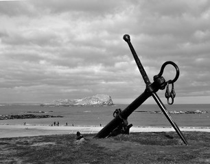 A strong metal anchor at the beach.