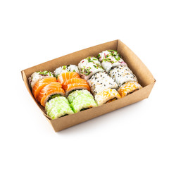 Sushi in a box of recycled paper isolated on white background. concept of organic food packaging