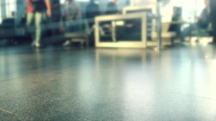 Defocusing. Busy Airport Terminal. Traveler at airport 