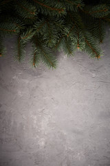 Christmas background. Christmas tree on concrete background.