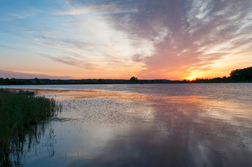 beautiful sunrise on the autumn lake