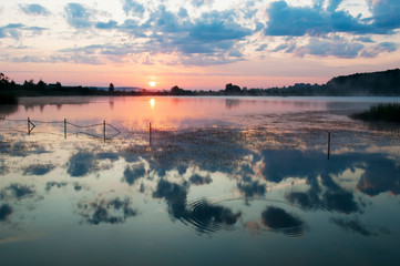 beautiful sunrise on the autumn lake