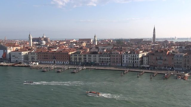 Venice, Italy: Aerial view of Venice waterfront: Promenade "Riva degli Schiavoni", in the background on the left the Basilica dei Santi Giovanni e Paolo, (view from a cruise liner)