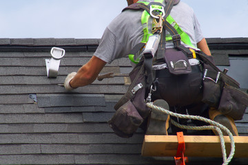 roof repair construction worker roofer man roofing security rope - obrazy, fototapety, plakaty