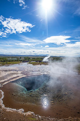 Geysir Strokkur calm before the vertical photo explosion. Iceland