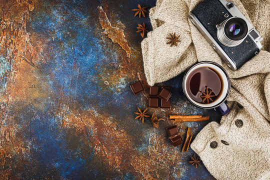 Hot winter tea with cinnamon stick and chocolate
