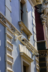 Security camera on a facade of the residential building