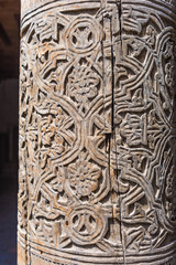 wooden pillar with carving, detail, friday mosque (juma mosque) in khiva, uzbekistan