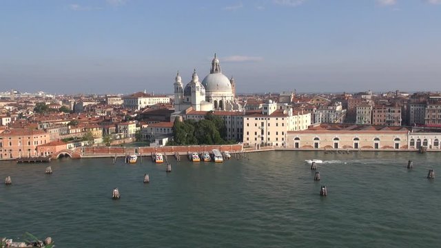 Aerial view video of Venice, Italy: waterfront with Basilica di Santa Maria della Salute (view from a cruise  liner on the Giudecca Canal)