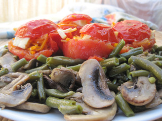 home- made dish salad with beans mushrooms and tomatoes