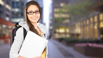 Young Female College Student  on background