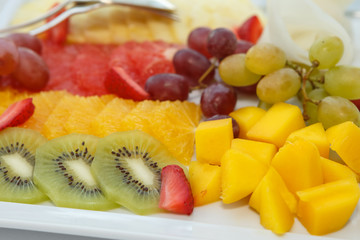 Sliced fruit on a platter
