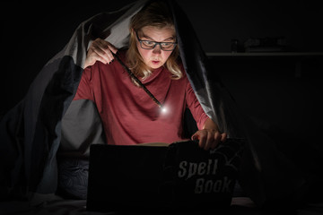 The sorceress reads the book of spells