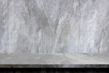gray cement table, congreate floor and shelf to display product