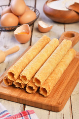 Handmade egg rolls on the wooden board