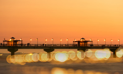 Baltic sea at beautiful sunset in Miedzyzdroje beach. Polish baltic coast. Famous city among the tourist.