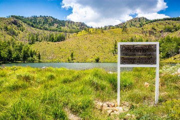 Signboard with informations about one of the lakes in National Park Lure