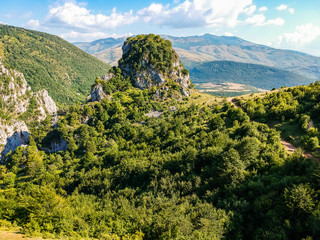 Fototapeta na wymiar Landmark in National Park Lure - huge rock hill Qafa e Kalase - in Albania