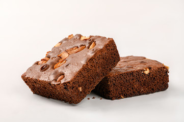  Fresh brownie with c ashew  nut isolated on white background.