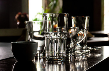 Set of empty glasses on table, Glasses and Table Setting in Restaurant
