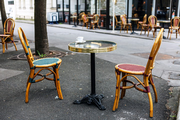 Fototapeta na wymiar Street French cafe. Coffee cup on a table. paris
