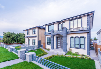 Houses in suburb at Summer in the north America. Luxury houses with nice landscape.