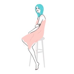 椅子に座って微笑む若い女性