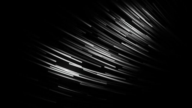 Abstract bunch of optical fibres in dinamic flight on black background, seamless loop. Animation. Light reflected on the moving wires, monochrome.