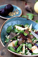 salad with fried chicken liver, beets, gorgonzola cheese, pear, cashew nuts, mini spinach.