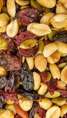 Mixed nuts. dried fruits and nuts top view background