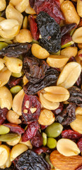 Mixed nuts. dried fruits and nuts top view background