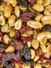 Mixed nuts. dried fruits and nuts top view background