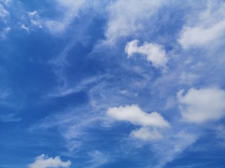Fototapeta na wymiar Stratocumulus white clouds in the blue sky natural background beautiful nature 