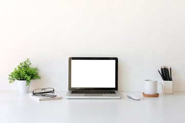 Workspace desk and laptop. copy space and blank screen. Business image, Blank screen laptop and supplies.