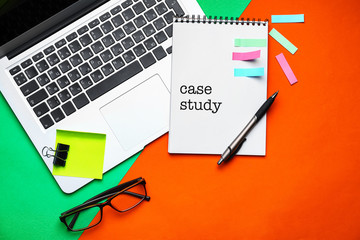 Laptop and school stationery on color background, top view. Concept of study